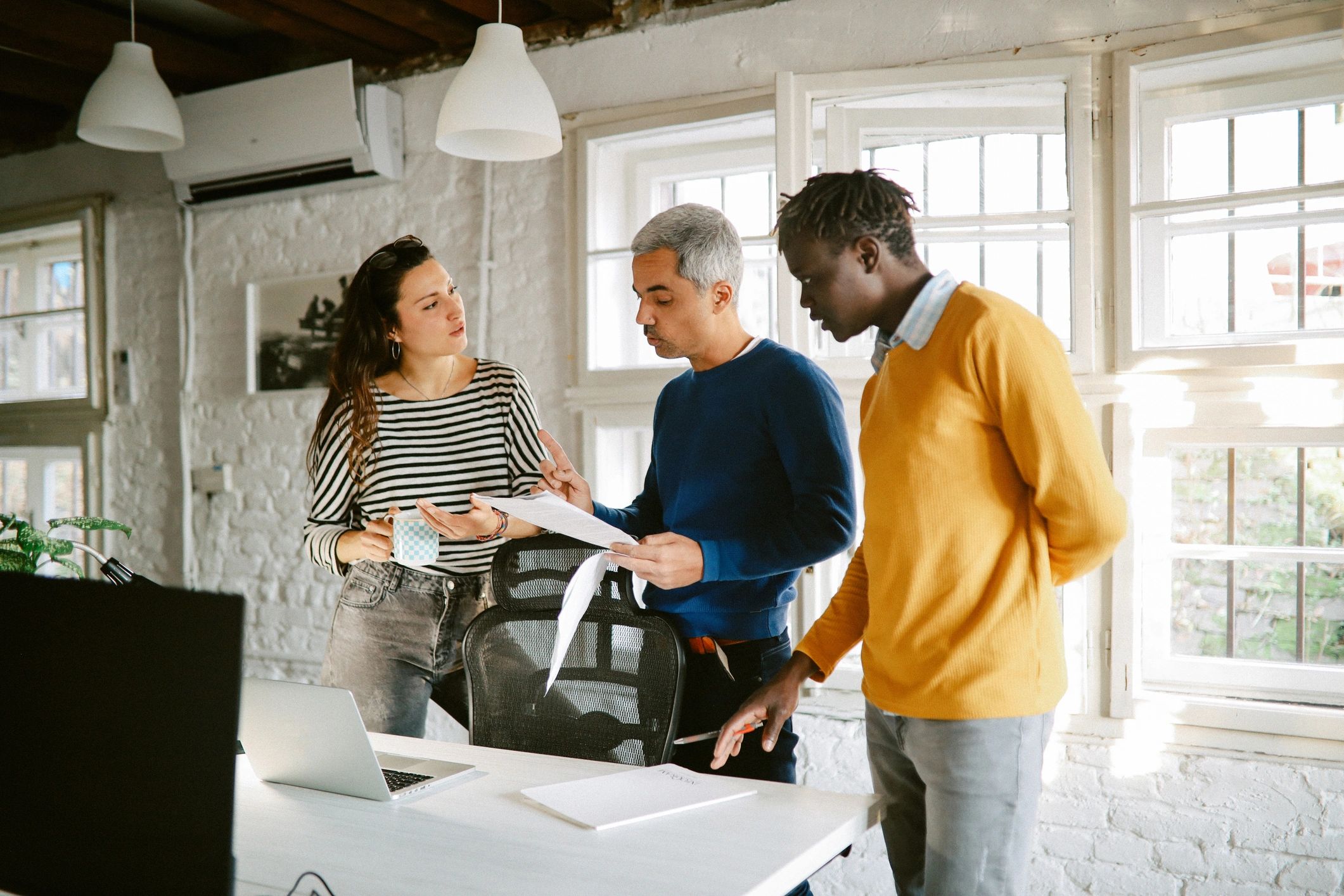 Professional team collaborating in a modern office
