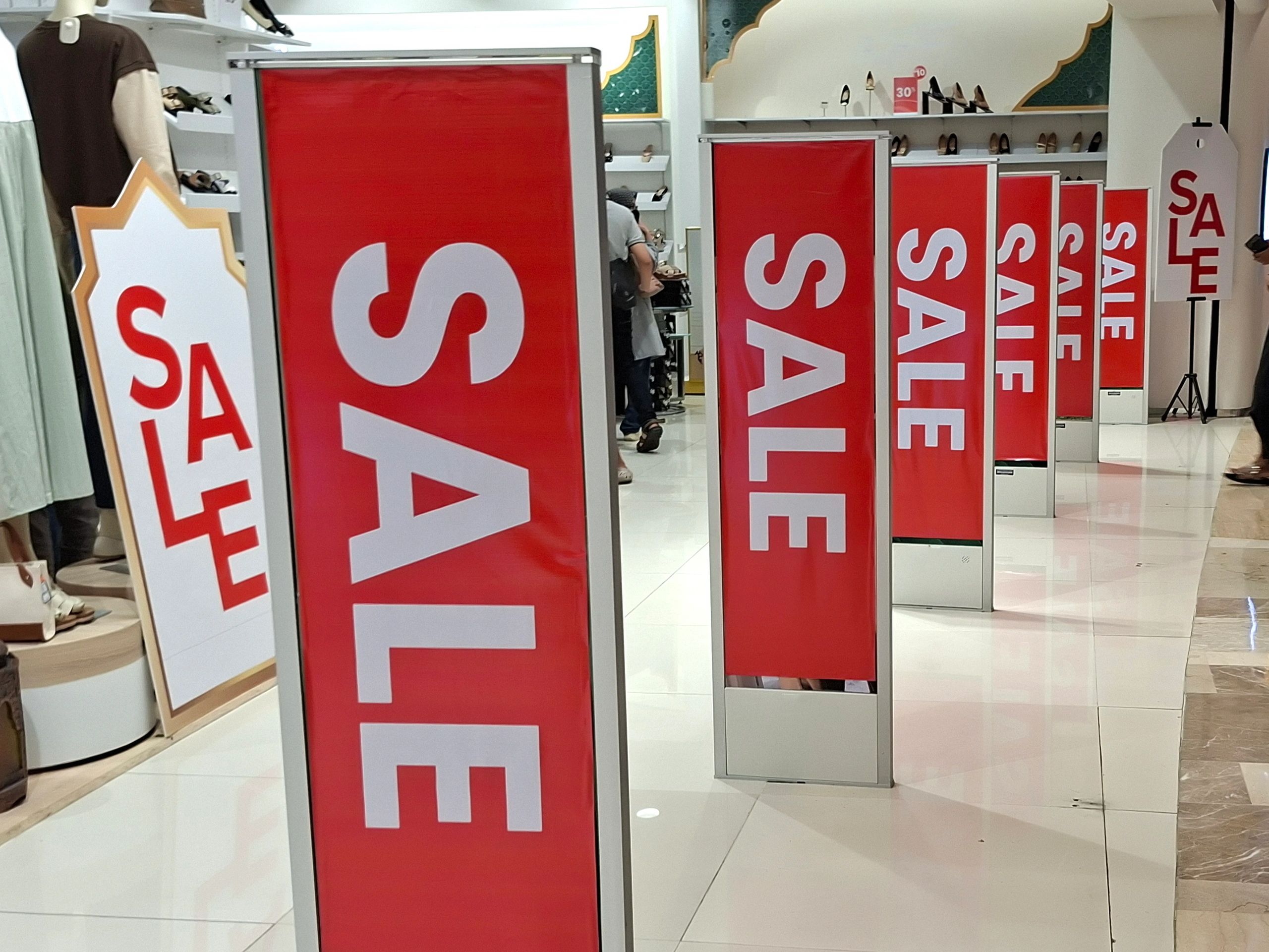 Outdoor vertical banners showing bold large-format print for promotions