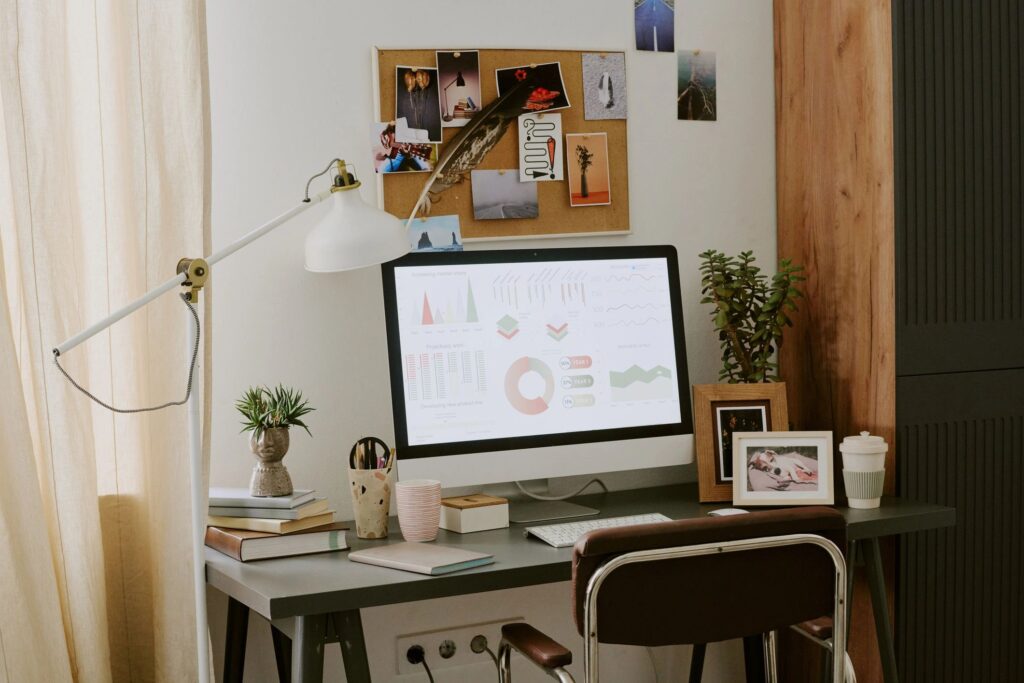 Home Office Workspace Displaying Business Analytics for Remote Work